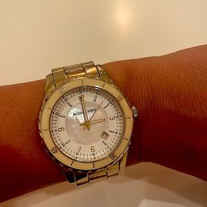 Michael Kors gold watch. Pearl & cream colored face.